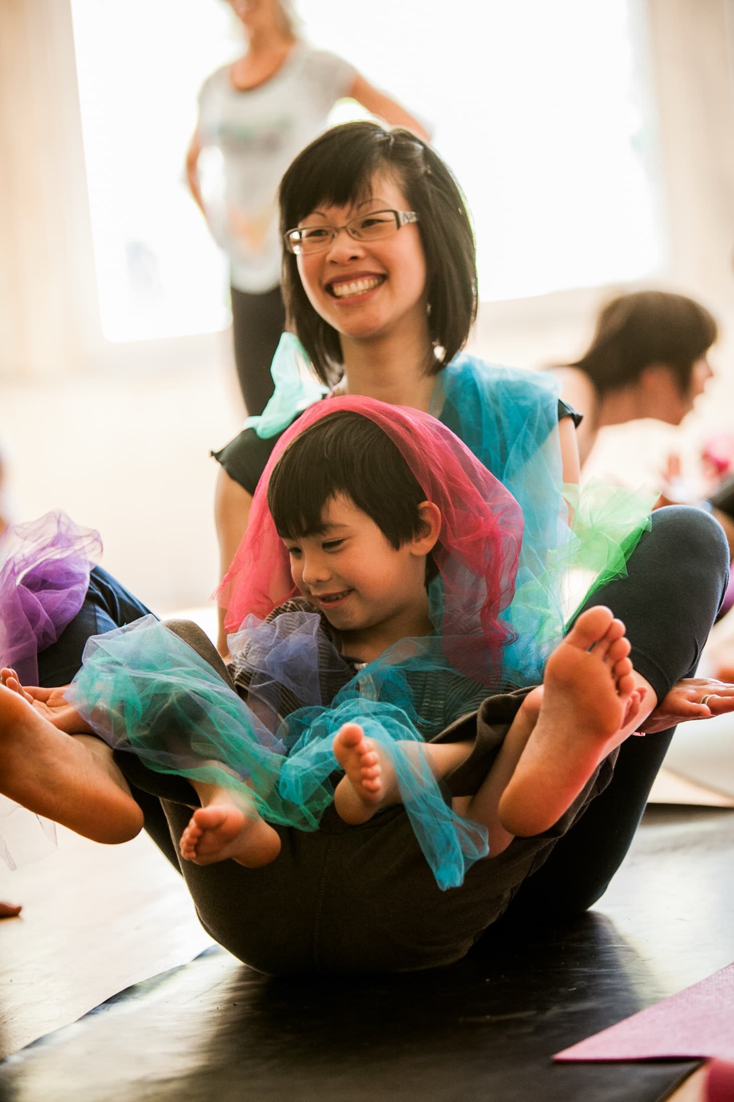 Rainbow Yoga class with children, colour and play